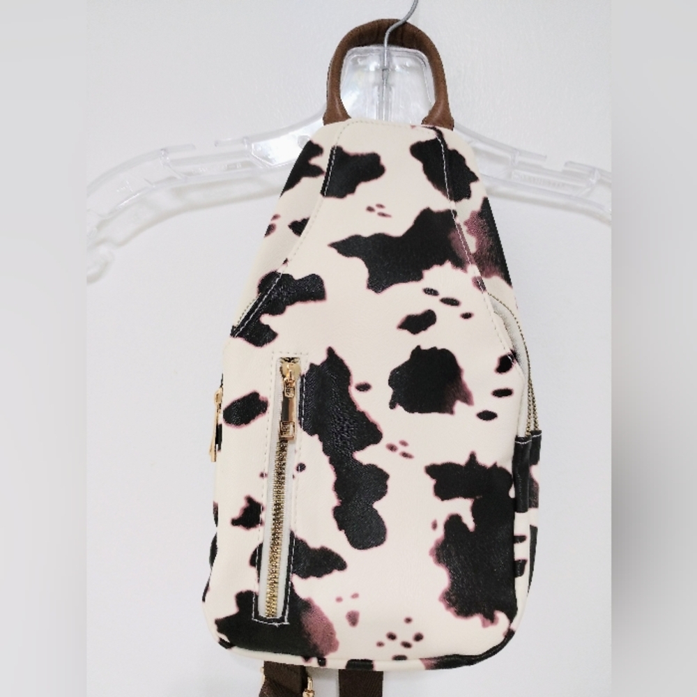 STYLISH COW PRINT CROSSBODY BACKPACK